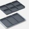 A must-have for sheet pan meals, these silicone baking trays provide separate cooking compartments for your meats, veggies, and marinades. From Prepd. YOUR PRO SET IN OLIVE GREEN, INCLUDES : Includes (1) sheet pan, (6) small square trays, and (3) large rectangular trays (1) roasting cook time insert Rigid silicone construction Microwave-, freezer-, and dishwasher-safe; oven safe to 450F (sheet pan not microwave safe, silicone inserts are microwave safe) Measures 4.96" x 3.35" x 10.24" Imported